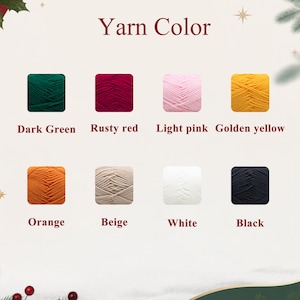 May include: A color chart titled Yarn Color displaying eight yarn skeins in dark green, rusty red, light pink, golden yellow, orange, beige, white, and black. Each square swatch is labeled with its corresponding color name below it.