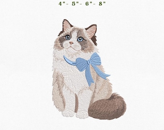 May include: An embroidery design of a fluffy cat with brown and white fur, blue eyes, and a light blue bow around its neck. Text reads: INSTANT DOWNLOAD 4" - 5" - 6" - 8" and PES - EXP - DST - JEF - VP3 - HUS - XXX.