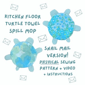 May include: Two turtle-shaped kitchen spill mops. One has a blue floral pattern, the other a blue and green pattern. The mops have checkered legs. Text reads "KITCHEN FLOOR TURTLE TOWEL SPILL MOP" and "SNAIL MAIL VERSION! PHYSICAL SEWING PATTERN + VIDEO + INSTRUCTIONS."