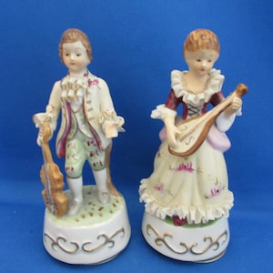 Two Colonial Musical Figurines