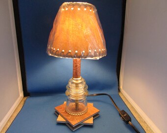 Lampada isolante in vetro