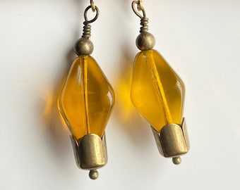 Polished topaz glass earrings with brass tulip bead caps, Translucent glass earrings with golden glow, Rustic vintage inspired earrings