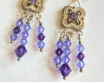 Flirty lilac chandelier earrings with sparkly Swarovski Purple Velvet and Tanzanite crystals suspended from artisan sterling ear wires