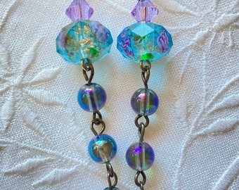 Flirty floral lampwork glass earrings with swingy tiers of glowing rainbow infused quartz, Sensuous blue & lavender glass dangle earrings