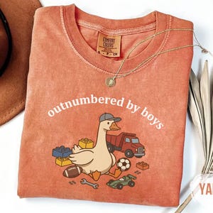Yam shirt with cute goose and toy-themed design