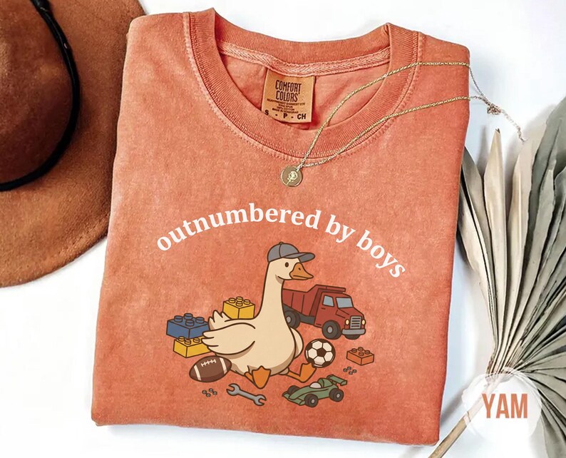 Yam shirt with cute goose and toy-themed design