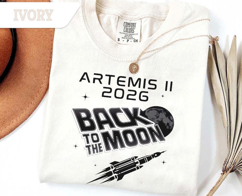 Ivory Comfort Colors Artemis II 2026 Back To The Moon shirt with black moon and rocket design