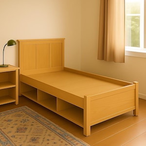 Könnte beinhalten: Ein hellfarbiger Bettrahmen aus Holz mit einem Kopfteil und eingebauten Staufächern. Das Bett ist aus hellfarbigem Holz gefertigt und hat ein schlichtes, modernes Design. Das Bett steht in einem Raum mit Fenster und Teppich.
