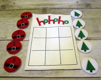 Handcrafted jolly Christmas tic tac toe game for boys and girls. Can be used as a gift or party favor.