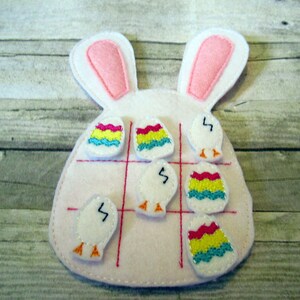 Handcrafted bunny tic tac toe game for boys and girls. Can be used as a gift or party favor.