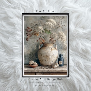 May include: A framed fine art print featuring a still life composition. A large, aged ceramic vase holds dried flowers. A small wooden bowl with decorative spheres and a dark blue bottle are on a wooden surface. The print includes the text "Fine Art Print."