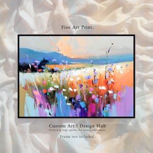 May include: Abstract landscape art print with a black frame. The artwork features a vibrant field of colorful flowers in shades of pink, purple, and white, set against a backdrop of blue mountains and an orange sunset. The text "Fine Art Print" is at the top.
