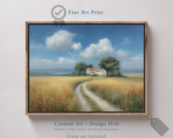 May include: Framed fine art print of a rural landscape. The artwork depicts a dirt road winding through a field of golden wheat towards a white house with a red roof under a blue sky with fluffy clouds. The text "Fine Art Print" is visible.
