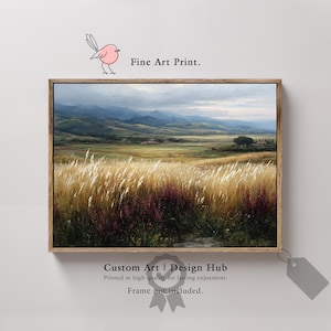 May include: A framed fine art print of a landscape painting. The artwork depicts a field of tall, golden grass and purple flowers, with rolling hills and a cloudy sky in the background. The text "Fine Art Print" is at the top.