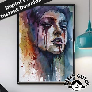 Puede incluir: Una impresión en acuarela enmarcada que presenta el rostro de una mujer con lágrimas. La obra de arte utiliza una paleta de azules, morados y rojos, con el texto "Digital Print Instant Download" en la esquina superior izquierda. El logotipo de Dream Glitch Studio está en la esquina inferior derecha.