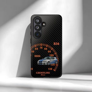 May include: Black phone case with a carbon fiber texture and an orange speedometer design. The design includes a car graphic, the text "R34", "RB26", and "Ghostline Series". The speedometer shows speeds from 0 to 130.