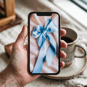 Blue Ribbon Phone Wallpaper – Pink Satin Aesthetic Lock Screen for iPhone & Android