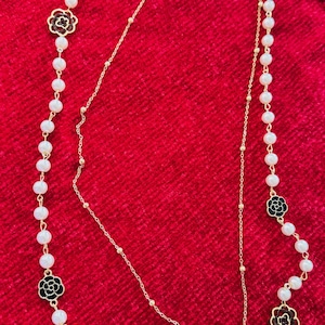 Elegant Long Pearl Necklace with Camellia Flower Accents