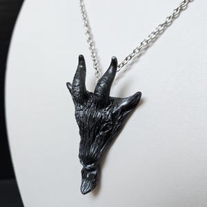 Goat necklace handmade from polymer clay with silver metalic powder