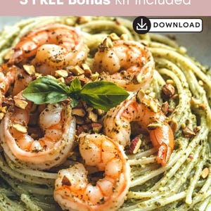 May include: A photograph of a pasta dish with prawns. The pasta is covered in a green sauce and garnished with cooked prawns, chopped nuts, and basil leaves. Text at the top reads "3 FREE Bonus Kit Included".