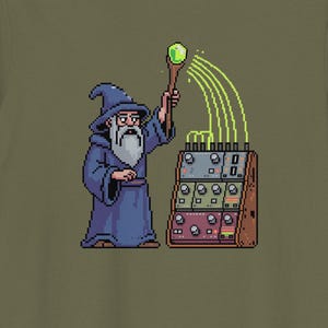 May include: Khaki green t-shirt with a pixelated wizard in a blue robe and hat, holding a staff with a green orb. The wizard is directing energy towards a brown electronic device. The design is a unique blend of fantasy and technology.