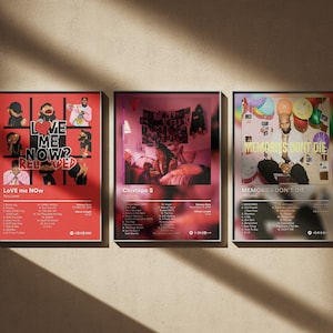 May include: Three framed posters with album art. The first is red with the text "LOVE ME NOW? RELAPED" and "LOVE me NOW". The second is purple with "Chixtape 5". The third is light purple with "MEMORIES DON'T DIE".