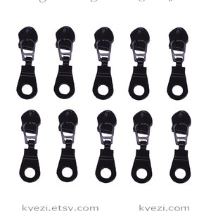 May include: Ten black zipper pulls with a metal loop at the bottom. The zipper pulls are designed to be used with zippers on clothing, bags, and other items.