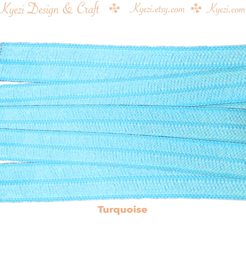 May include: Turquoise elastic cord, a type of stretch cord, is shown in a close-up image. The cord is arranged in parallel lines, showcasing its texture and color.