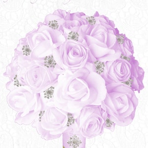 May include: A bouquet of pale purple roses with silver embellishments. The bouquet is tied with a pale purple ribbon and green stems. The text "Kyezi Design & Craft" is at the top.