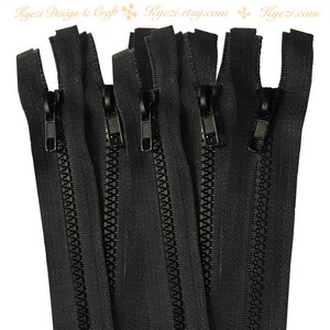 May include: Five black zipper closures with metal sliders. The zippers are approximately 10 inches long.