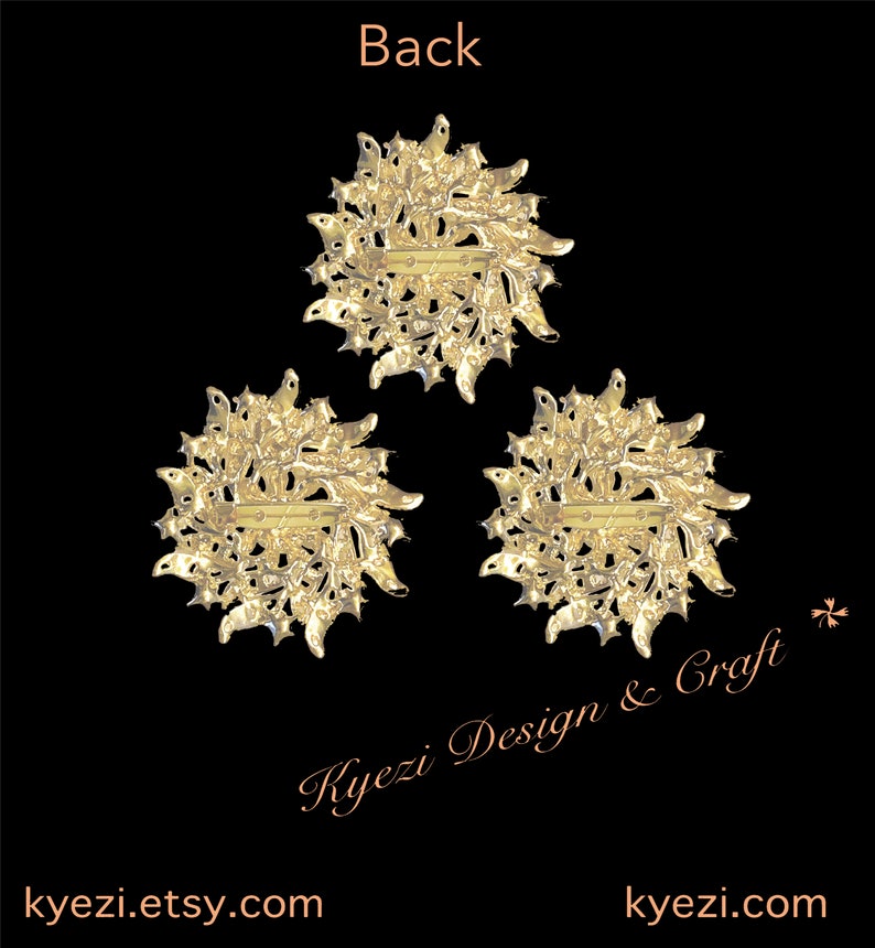 May include: Three gold brooches with a floral design are shown against a black background. Each brooch has a pin closure on the back. The word "Back" is at the top, and the Etsy shop name is at the bottom of the image.