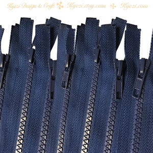 May include: A pack of 10 navy blue zipper closures. Each zipper is 10 inches long and has a metal slider.