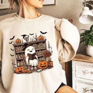 Reading Ghost Halloween Sweatshirt: Book Lover Spooky Season Shirt