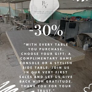 May include: A large, rectangular, light gray table with a textured surface. The image includes the text "-30%" and a message about choosing a gift with purchase. The Bottega Vellut logo is also visible.