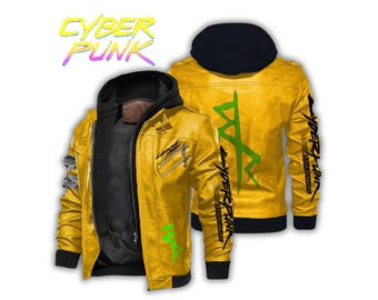 May include: A yellow Cyberpunk-themed jacket with a black hood and accents. The jacket features green and black graphics on the front and back, with the word "CYBER PUNK" in a gradient font at the top. The jacket has a zipper closure.