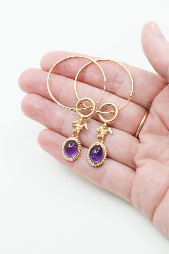 Vintage 14 Karat Gold and Amethyst Cherub Earrings | Solid Gold Hoops with Figural Drop Accents | Purple Stone