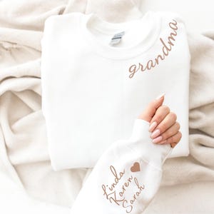 Custom Grandma Sweatshirt with Grandkids Names on Sleeve, Personalized Grandma hoodie, Mothers Day Gift, Gigi, Mimi, Grandma Gift, Granny