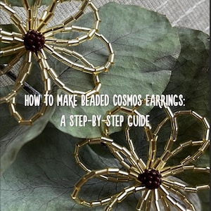 May include: Close-up of two gold beaded cosmos earrings with a dark maroon center. The earrings are on a background of green leaves. Text on the image reads: "HOW TO MAKE BEADED COSMOS EARRINGS: A STEP-BY-STEP GUIDE" and "BY @NO_VSE".