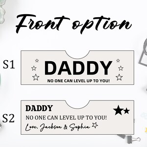 May include: Two light beige card designs with the word "DADDY" in bold black font. One design includes the text "NO ONE CAN LEVEL UP TO YOU!" and star graphics. The second design includes the text "NO ONE CAN LEVEL UP TO YOU!" and "Love, Jackson & Sophia."