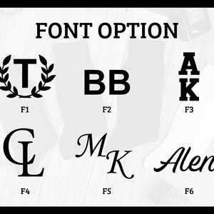 May include: Image displaying six font options for personalization. The fonts include a letter "T" inside a laurel wreath, the letters "BB", the letters "AK", the letters "CL", the letters "MK", and the name "Alen".