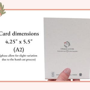 May include: A rectangular off-white card with a speckled texture. Text reads: Card dimensions 4.25" x 5.5" (A2) (please allow for slight variation due to the hand-cut process). The back features a logo with a goose and the text TINKER GOOSE.
