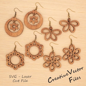 May include: Seven wooden earrings in different floral and geometric shapes. The earrings are laser cut with detailed patterns and have brass-coloured ear wires. The image includes the text "SVG - Laser Cut File" and "Creative Vector Files."