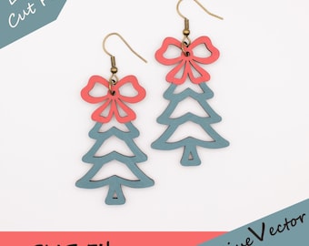 May include: A pair of Christmas tree earrings with a bow design. The earrings are laser cut from wood and painted in coral and teal. The earrings have gold-colored ear wires. The image also contains the text "Laser Cut File" and "SVG File".