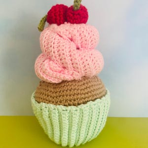 buttercream cupcake with bing cherries handmade crochet plushie