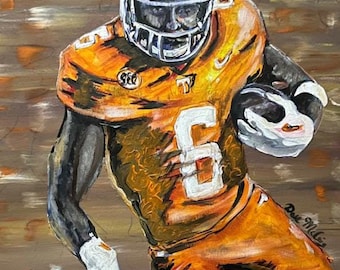 Dylan Sampson anota 4 touchdowns y Tennessee derrota a Kent State 71-0