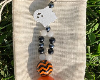 El llavero con dije de bolso de Halloween