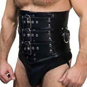 May include: Black leather corset with multiple buckle closures. The corset has three rows of buckles on the front and a single buckle on the side. The garment is designed to cinch the waist and provide support.