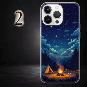 May include: A phone case with a pixelated illustration of a campfire scene under a starry night sky. The design includes a tent, trees, and a bonfire, creating a camping theme. The case is designed for a smartphone.
