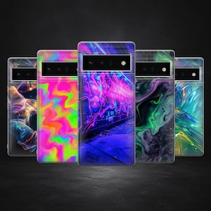 May include: Five phone cases with distinct designs. One case showcases a neon graffiti alley, while others display abstract patterns in vibrant colours such as pink, green, and blue. The cases have a clear border and a camera cutout.
