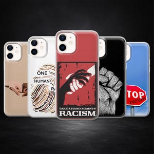 May include: A selection of phone cases with diverse designs. One case displays a hand reaching out, another a fingerprint with the words "ONE HUMAN RACE", and another a fist. The cases have the text "TAKE A HAND AGAINST RACISM" and "STOP racism".
